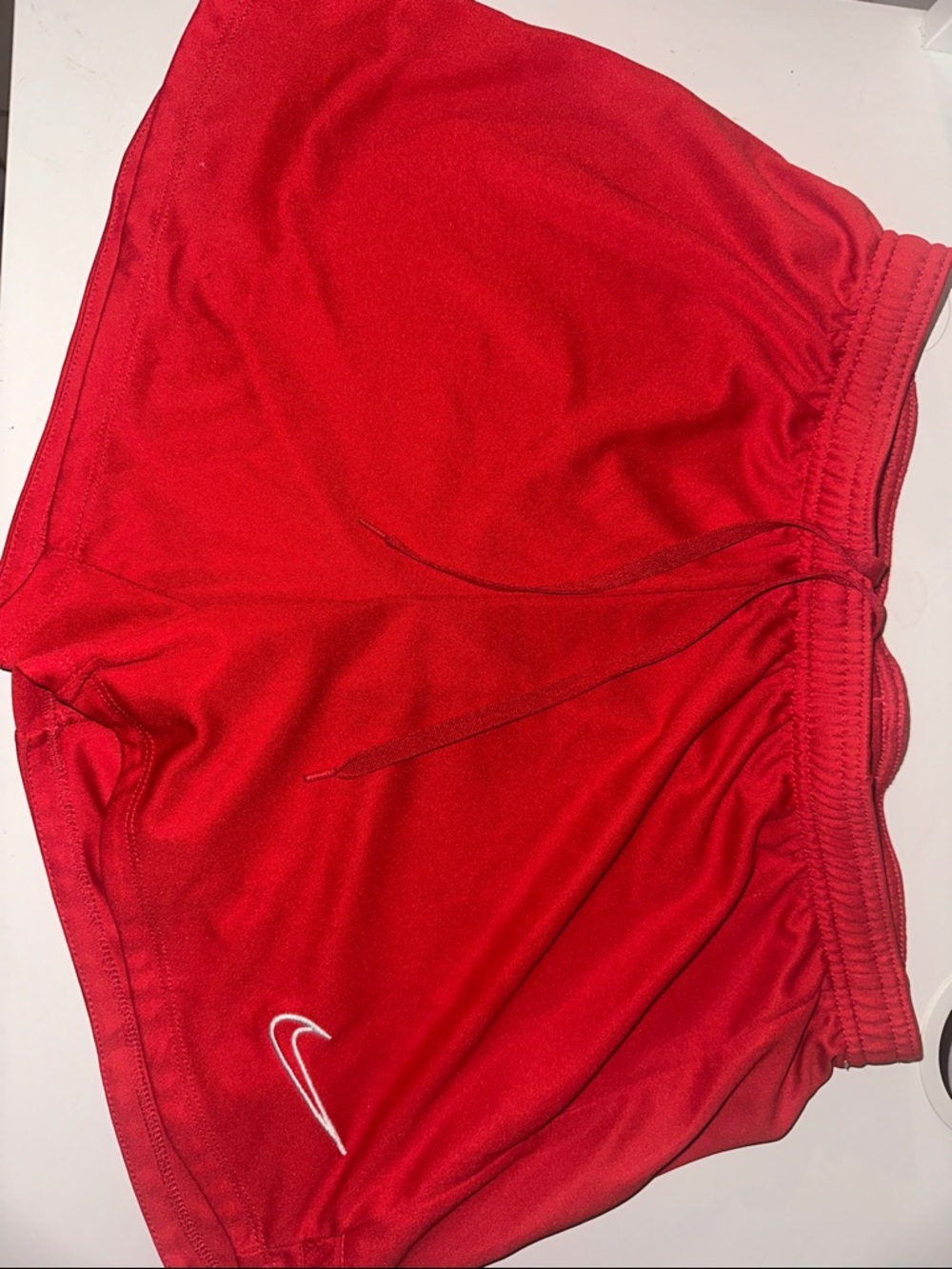 Nike Red Women's Athletic Shorts with White Swoosh